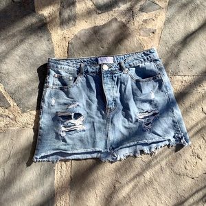 Distressed denim skirt
